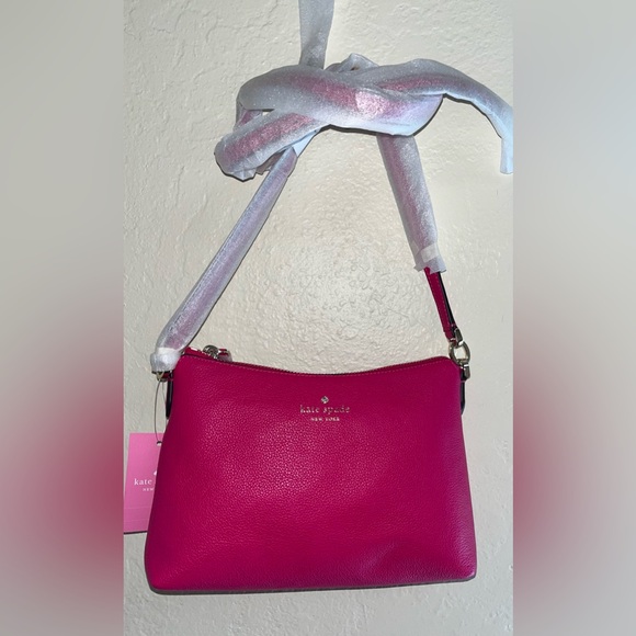 kate spade Handbags - Kate Spade Pink Crossbody Bag new with tags.